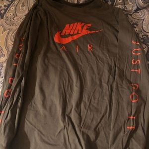 olive green and orange nike shirt